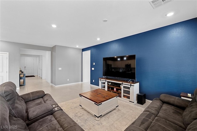 5455 Eleganza Ave, Pahrump, NV 89061 - living room with recessed lighting, visible vents, and baseboards