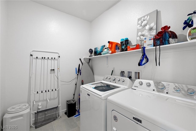 5455 Eleganza Ave, Pahrump, NV 89061 - washroom with laundry area, light tile patterned floors, and washer and clothes dryer
