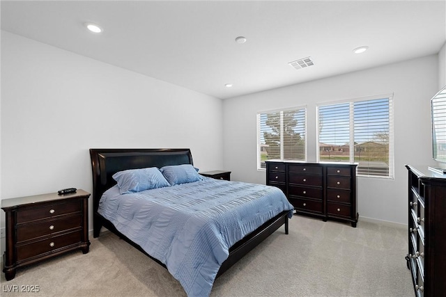 5455 Eleganza Ave, Pahrump, NV 89061 - bedroom featuring light carpet, visible vents, and recessed lighting