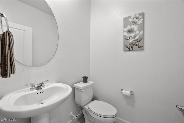 5455 Eleganza Ave, Pahrump, NV 89061 - bathroom featuring a sink and toilet