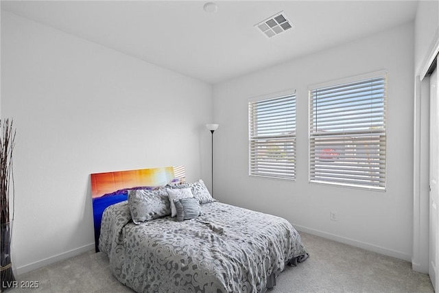 5455 Eleganza Ave, Pahrump, NV 89061 - carpeted bedroom featuring baseboards and visible vents