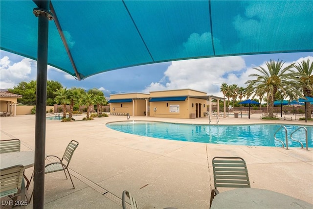 5455 Eleganza Ave, Pahrump, NV 89061 - community pool featuring a patio area
