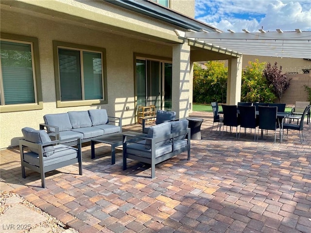 view of patio with a pergola, outdoor dining area, and outdoor lounge area