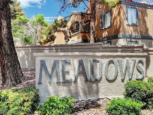 view of community sign