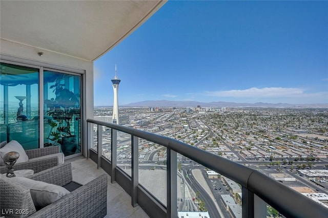 balcony featuring a mountain view