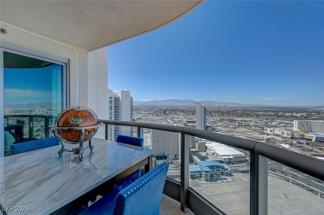 balcony featuring a view of city