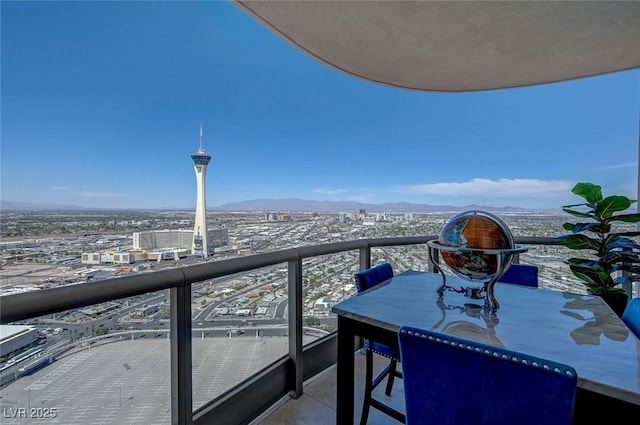 balcony featuring a mountain view