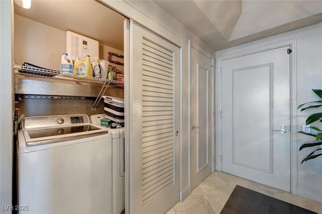 laundry room with laundry area and washing machine and dryer