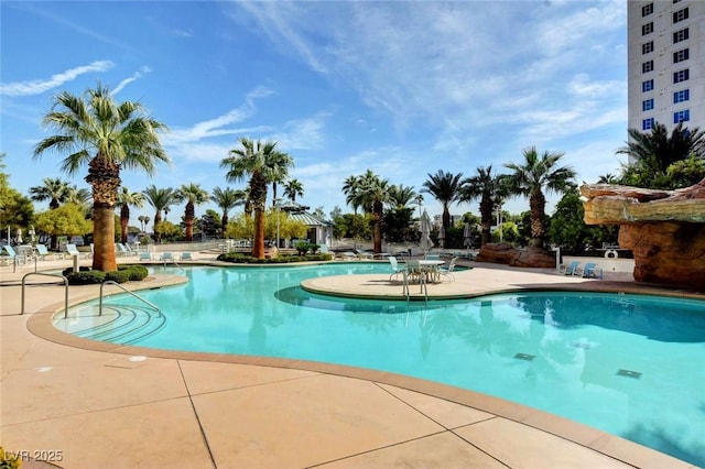 pool with a patio area