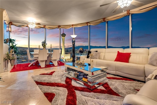 living room with a ceiling fan