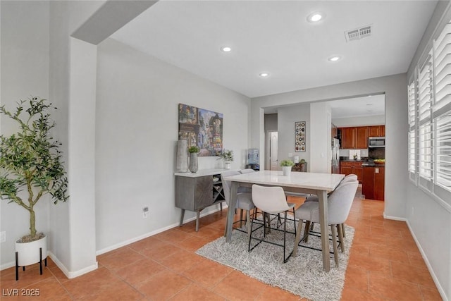 9413 Artesian Oak Ct, Las Vegas, NV 89149 - dining space featuring baseboards, visible vents, recessed lighting, and light tile patterned floors