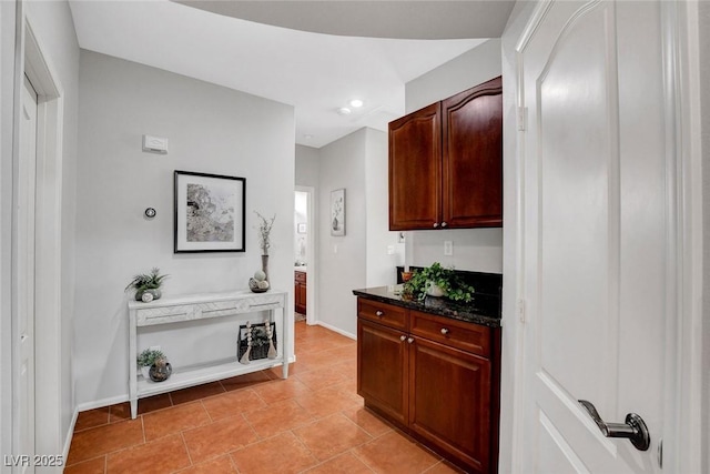 9413 Artesian Oak Ct, Las Vegas, NV 89149 - bar with recessed lighting, baseboards, and light tile patterned floors