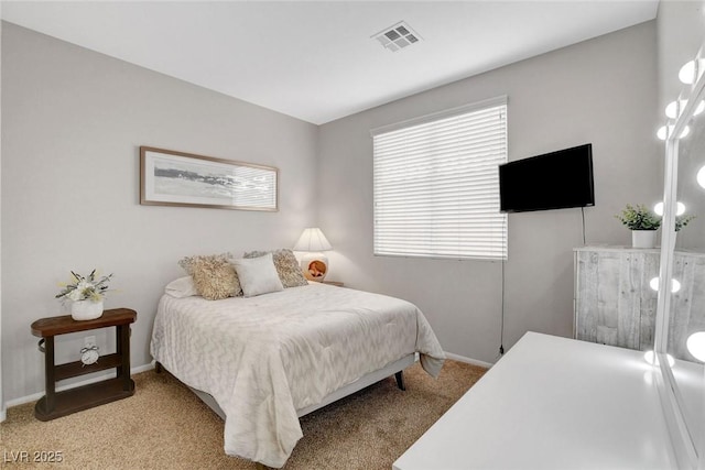 9413 Artesian Oak Ct, Las Vegas, NV 89149 - carpeted bedroom with baseboards and visible vents