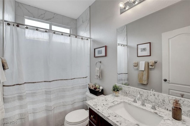 9413 Artesian Oak Ct, Las Vegas, NV 89149 - bathroom featuring curtained shower, toilet, and vanity