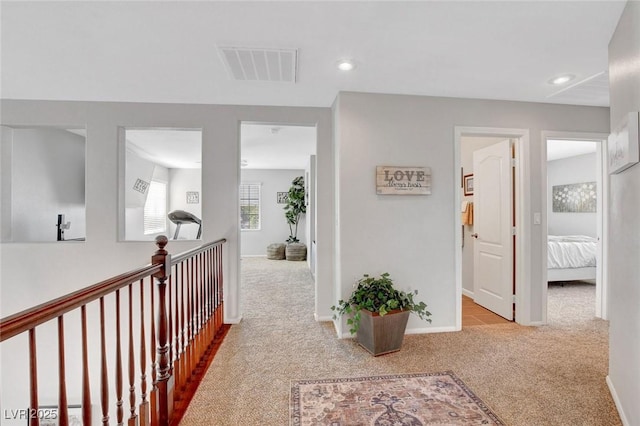 9413 Artesian Oak Ct, Las Vegas, NV 89149 - corridor featuring baseboards, visible vents, carpet, and recessed lighting
