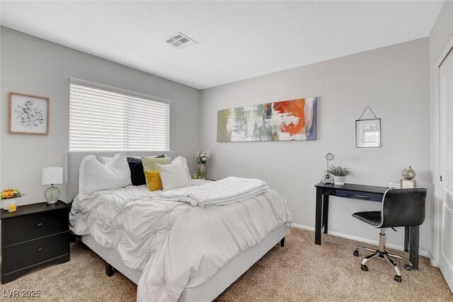 9413 Artesian Oak Ct, Las Vegas, NV 89149 - bedroom featuring visible vents, baseboards, and light carpet
