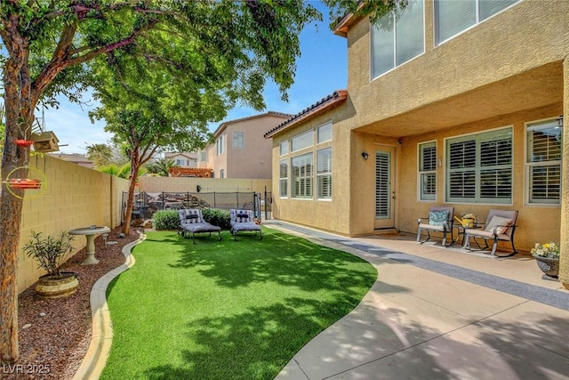 9413 Artesian Oak Ct, Las Vegas, NV 89149 - view of yard featuring a patio area and a fenced backyard