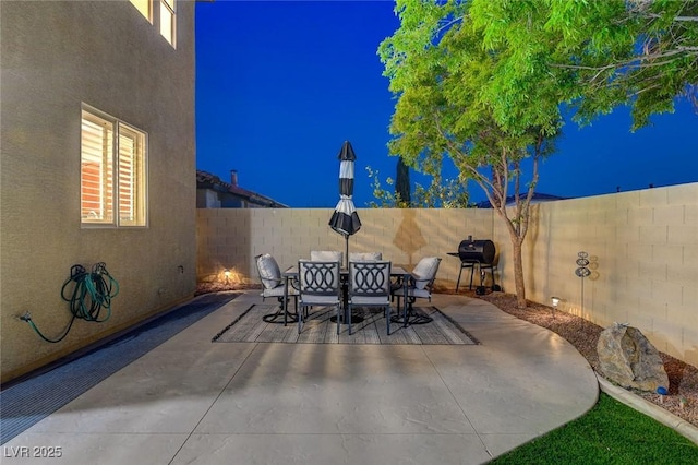 9413 Artesian Oak Ct, Las Vegas, NV 89149 - view of patio with outdoor dining space and a fenced backyard