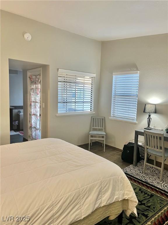 bedroom with wood finished floors