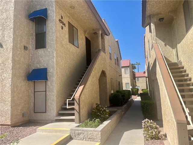 view of property with stairway