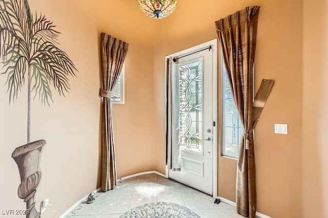 215 Sunset Shower Dr, Henderson, NV 89012 - doorway with light tile patterned floors and baseboards