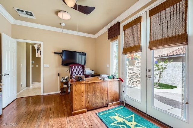 215 Sunset Shower Dr, Henderson, NV 89012 - office space with wood finished floors, french doors, crown molding, and visible vents