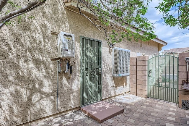 215 Sunset Shower Dr, Henderson, NV 89012 - exterior space featuring a gate