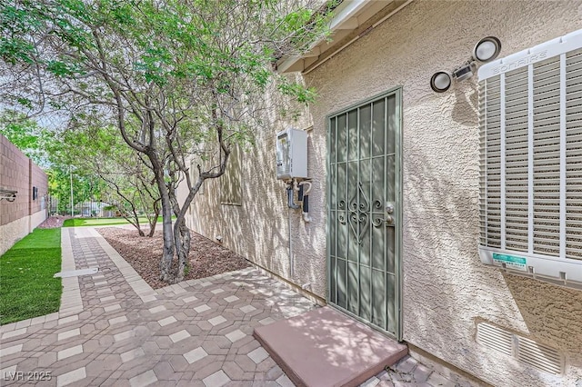 215 Sunset Shower Dr, Henderson, NV 89012 - entrance to property featuring a patio and fence