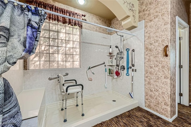 215 Sunset Shower Dr, Henderson, NV 89012 - bathroom featuring a walk in shower and a healthy amount of sunlight
