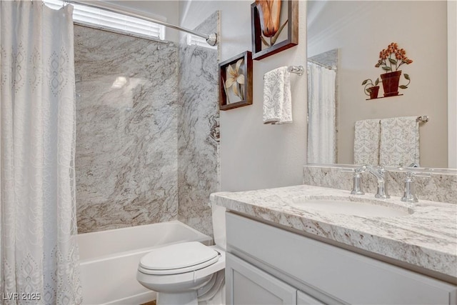 bathroom with vanity, shower / bath combination with curtain, and toilet