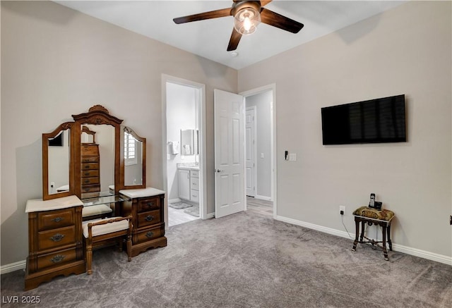 interior space with baseboards and a ceiling fan