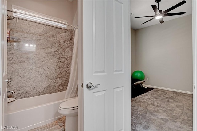 bathroom with shower / tub combo, a ceiling fan, and toilet