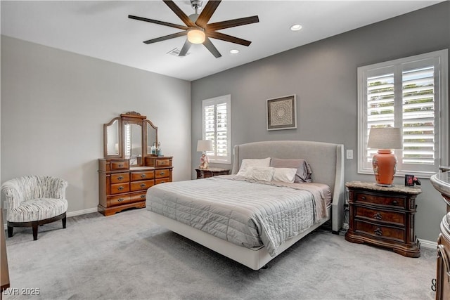 carpeted bedroom featuring baseboards, a ceiling fan, visible vents, and recessed lighting