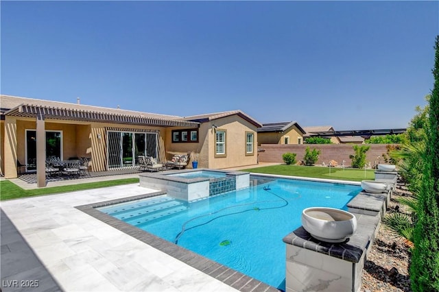 view of swimming pool featuring a patio, a fenced backyard, and a pool with connected hot tub