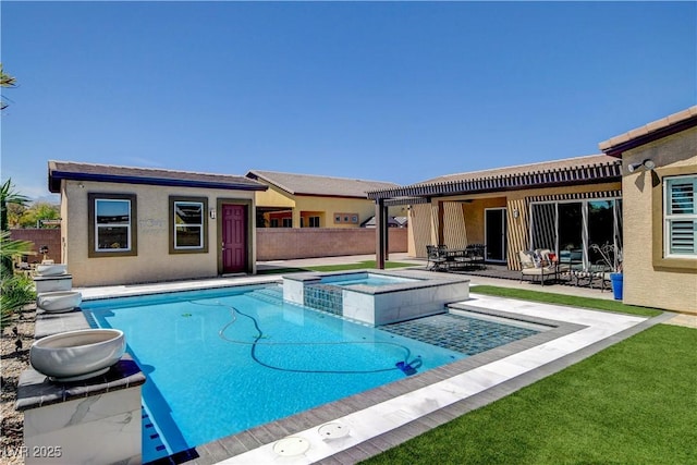 view of swimming pool featuring a patio, a pool with connected hot tub, and fence