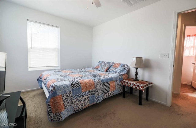 1035 Spotted Saddle St, Henderson, NV 89015 - bedroom featuring baseboards, visible vents, carpet floors, and ceiling fan