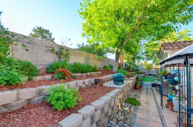 4517 Inez Dr, Las Vegas, NV 89130 - fenced backyard featuring a gazebo and a patio area