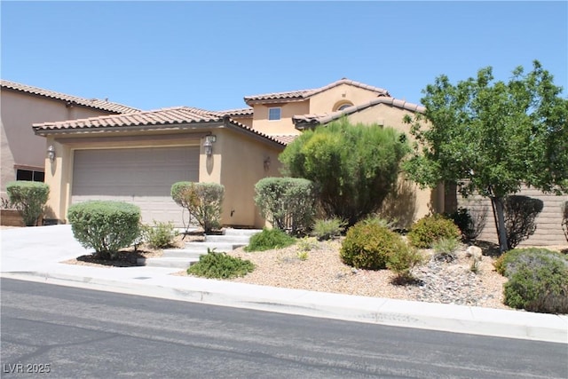 932 Tafalla Ct, Las Vegas, NV 89138 - mediterranean / spanish house with a garage, stucco siding, concrete driveway, and a tile roof