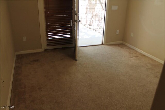 932 Tafalla Ct, Las Vegas, NV 89138 - carpeted empty room with baseboards