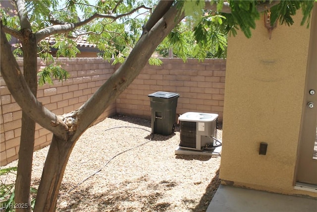 932 Tafalla Ct, Las Vegas, NV 89138 - exterior details with stucco siding, fence, and central AC