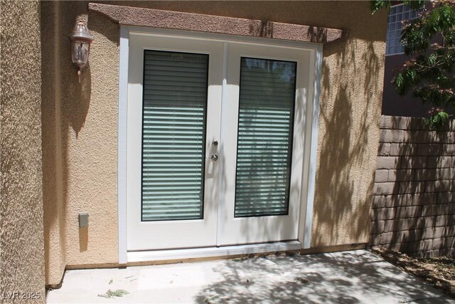 932 Tafalla Ct, Las Vegas, NV 89138 - doorway to property featuring french doors and stucco siding