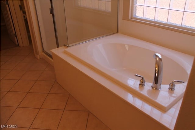 932 Tafalla Ct, Las Vegas, NV 89138 - bathroom featuring a shower stall, a bath, and tile patterned flooring