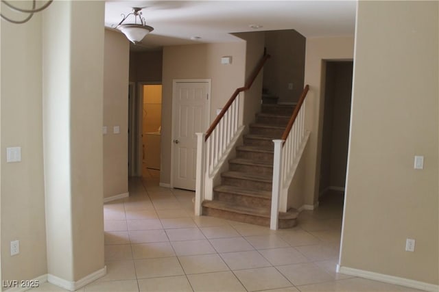 932 Tafalla Ct, Las Vegas, NV 89138 - staircase featuring tile patterned floors and baseboards