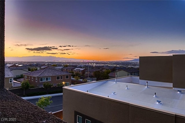 exterior space featuring a residential view and a balcony