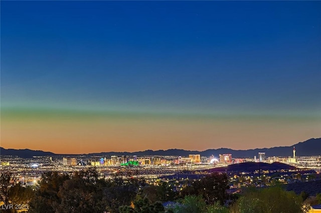property view of mountains featuring a view of city