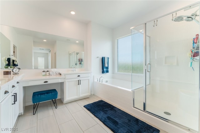 bathroom with vanity, a garden tub, recessed lighting, tile patterned floors, and a shower stall