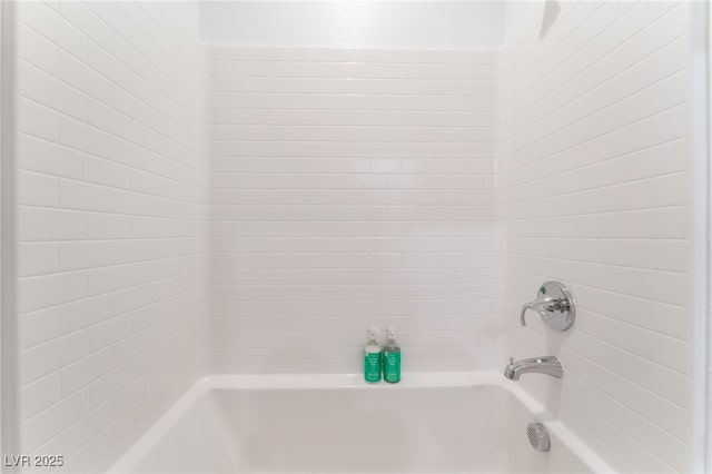 full bath featuring shower / tub combination