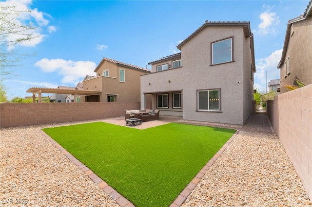 7132 Sayonara Vista St, North Las Vegas, NV 89084 - back of house featuring a fenced backyard, stucco siding, and a patio area