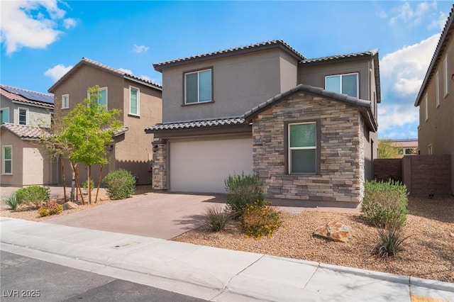 7132 Sayonara Vista St, North Las Vegas, NV 89084 - view of front facade featuring stone siding, a tiled roof, stucco siding, a garage, and concrete driveway