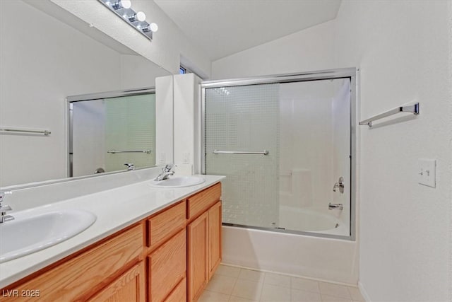 681 Peach Coral St, Las Vegas, NV 89183 - bathroom featuring a sink, tile patterned floors, double vanity, and lofted ceiling